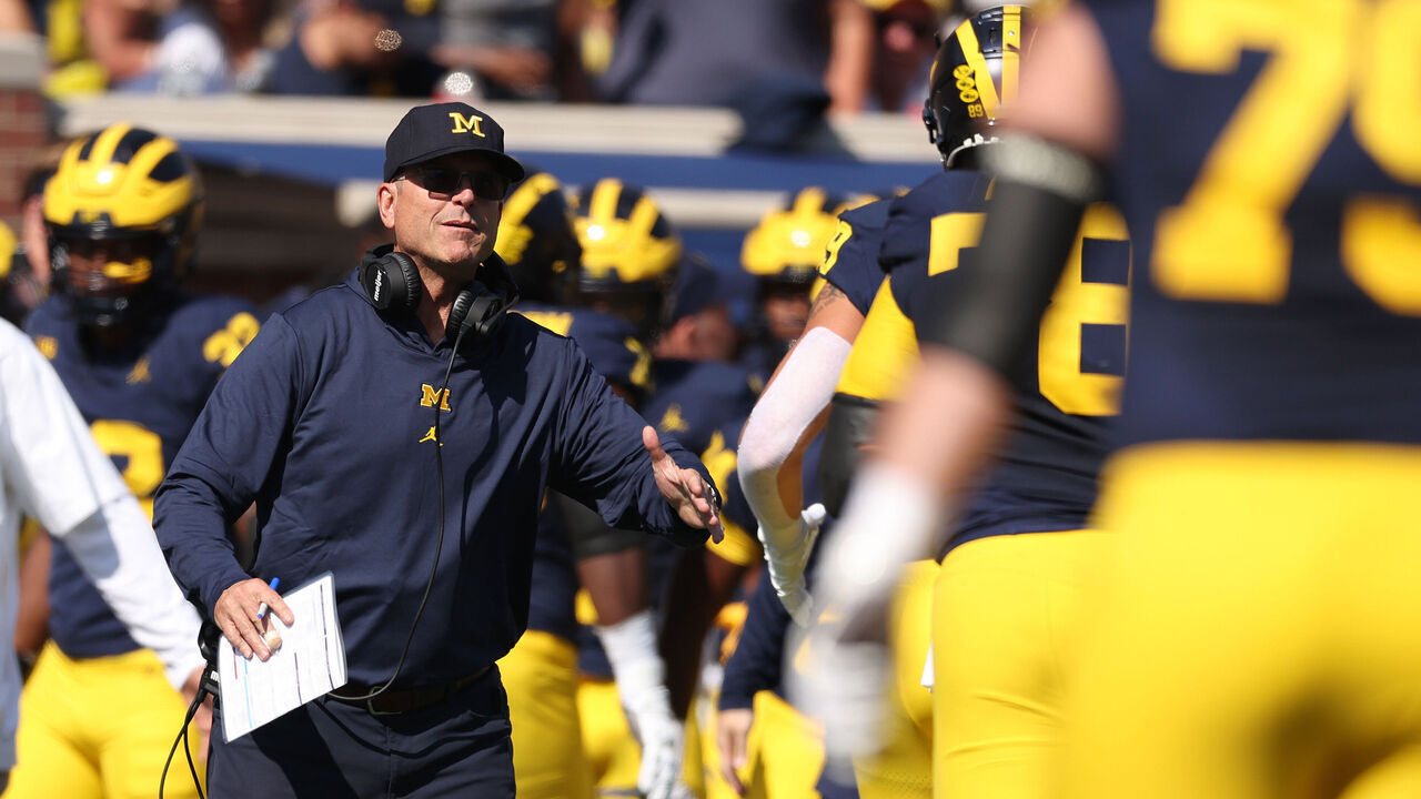 ANN ARBOR, MICHIGAN - SEPTEMBER 23: Head coach Jim Harbaugh of the Michigan Wolverines looks on in the first half while playing the Rutgers Scarlet Knights at Michigan Stadium on September 23, 2023 in Ann Arbor, Michigan.