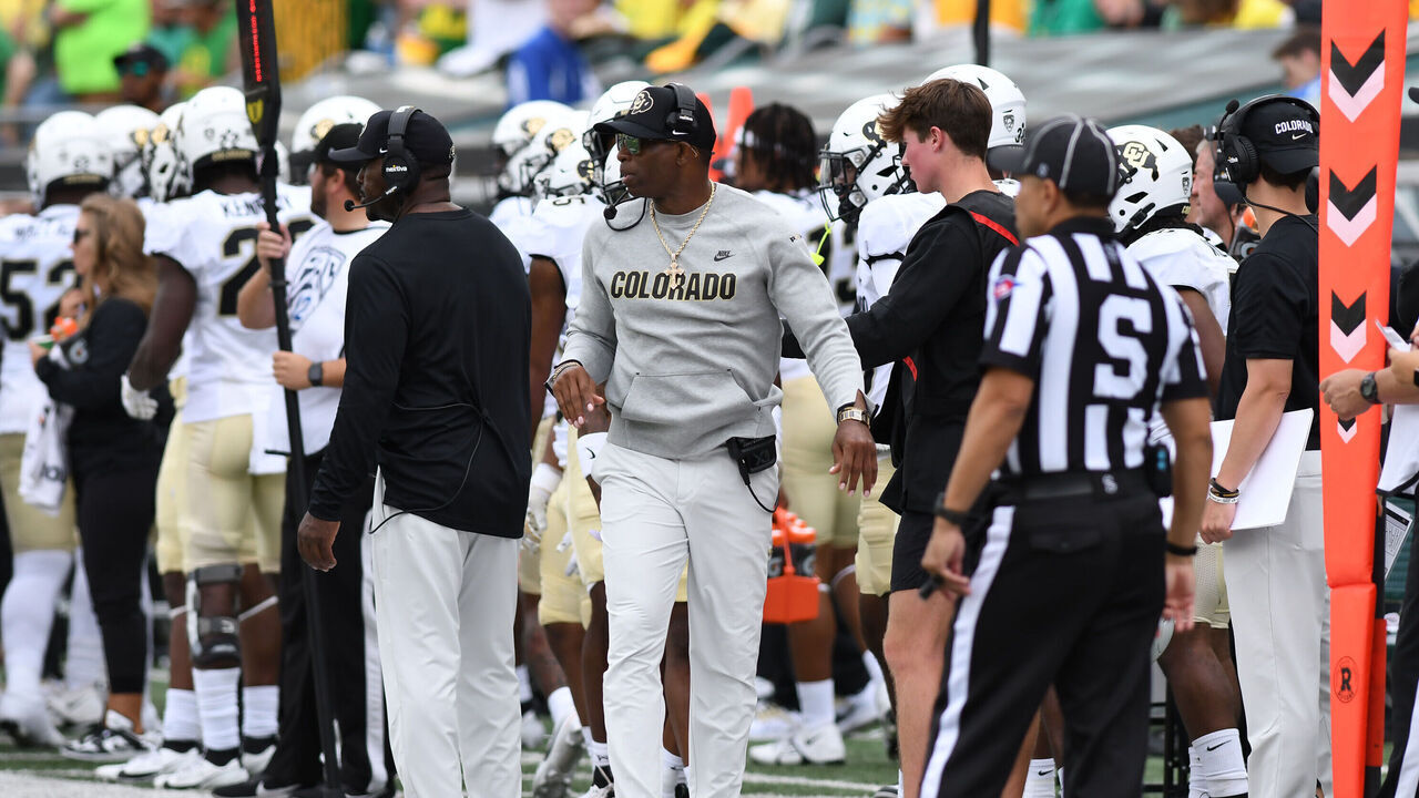 EUGENE, OR - SEPTEMBER 23: Colorado Buffaloes head coach Deion Sanders loos to the field during a PAC-12 conference football game between the Colorado Buffaloes and Oregon Ducks on September 23, 2023 at Autzen Stadium in Eugene, Oregon.