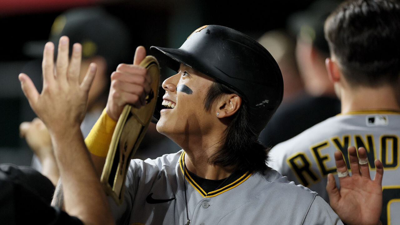 CINCINNATI, OHIO - SEPTEMBER 23: Ji Hwan Bae #3 of the Pittsburgh Pirates celebrate safter scoring in the 6th inning against the Cincinnati Reds at Great American Ball Park on September 23, 2023 in Cincinnati, Ohio.