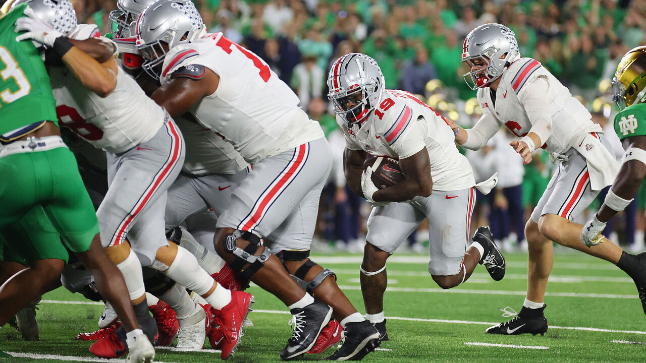 SOUTH BEND, INDIANA - SEPTEMBER 23: Chip Trayanum #19 of the Ohio State Buckeyes scores a touchdown against the Notre Dame Fighting Irish during the fourth quarter at Notre Dame Stadium on September 23, 2023 in South Bend, Indiana.