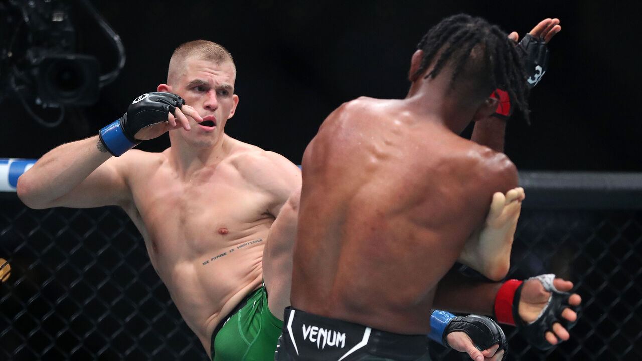 BOSTON, MASSACHUSETTS - AUGUST 19: Ian Machado Garry throws a kick against Neil Magny during their Welterweight bout at UFC 292 at TD Garden on August 19, 2023 in Boston, Massachusetts.