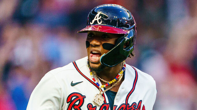 ATLANTA, GA - SEPTEMBER 19: Ronald Acuna Jr. #13 of the Atlanta Braves celebrates after hitting a leadoff-home run against the Philadelphia Phillies at Truist Park on September 19, 2023 in Atlanta, Georgia.