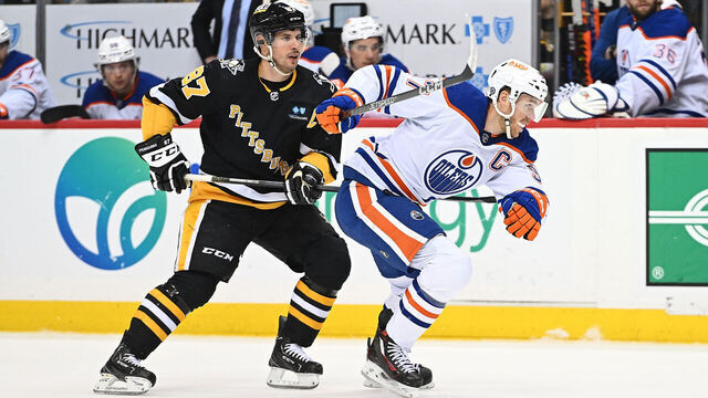 PITTSBURGH, PA - FEBRUARY 23: Connor McDavid #97 of the Edmonton Oilers skates against Sidney Crosby #87 of the Pittsburgh Penguins in the second period during the game at PPG PAINTS Arena on February 23, 2023 in Pittsburgh, Pennsylvania.