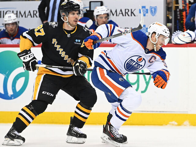 PITTSBURGH, PA - FEBRUARY 23: Connor McDavid #97 of the Edmonton Oilers skates against Sidney Crosby #87 of the Pittsburgh Penguins in the second period during the game at PPG PAINTS Arena on February 23, 2023 in Pittsburgh, Pennsylvania.
