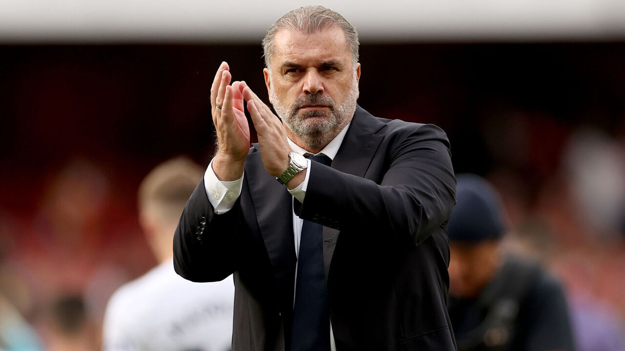 LONDON, ENGLAND - SEPTEMBER 24: Ange Postecoglou, Manager of Tottenham Hotspur, acknowledges the fans after the Premier League match between Arsenal FC and Tottenham Hotspur at Emirates Stadium on September 24, 2023 in London, England.
