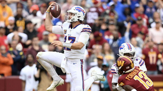 LANDOVER, MARYLAND - SEPTEMBER 24: Josh Allen #17 of the Buffalo Bills runs in for a touchdown during the fourth quarter of a game against the Washington Commanders at FedExField on September 24, 2023 in Landover, Maryland.