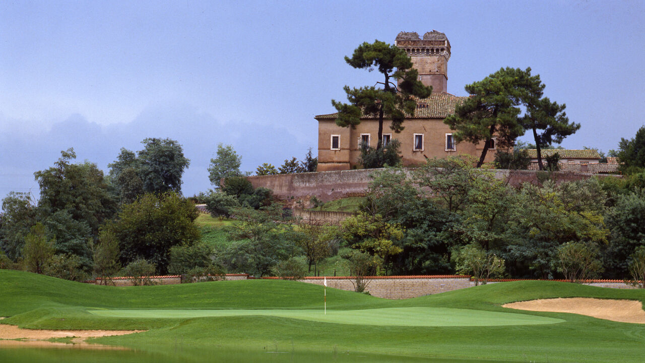 View of the course at the Marco Simone Golf & Country Club and, behind it, Marco Simone castle, Guidonia Montecelio, Italy, May 20, 1992.