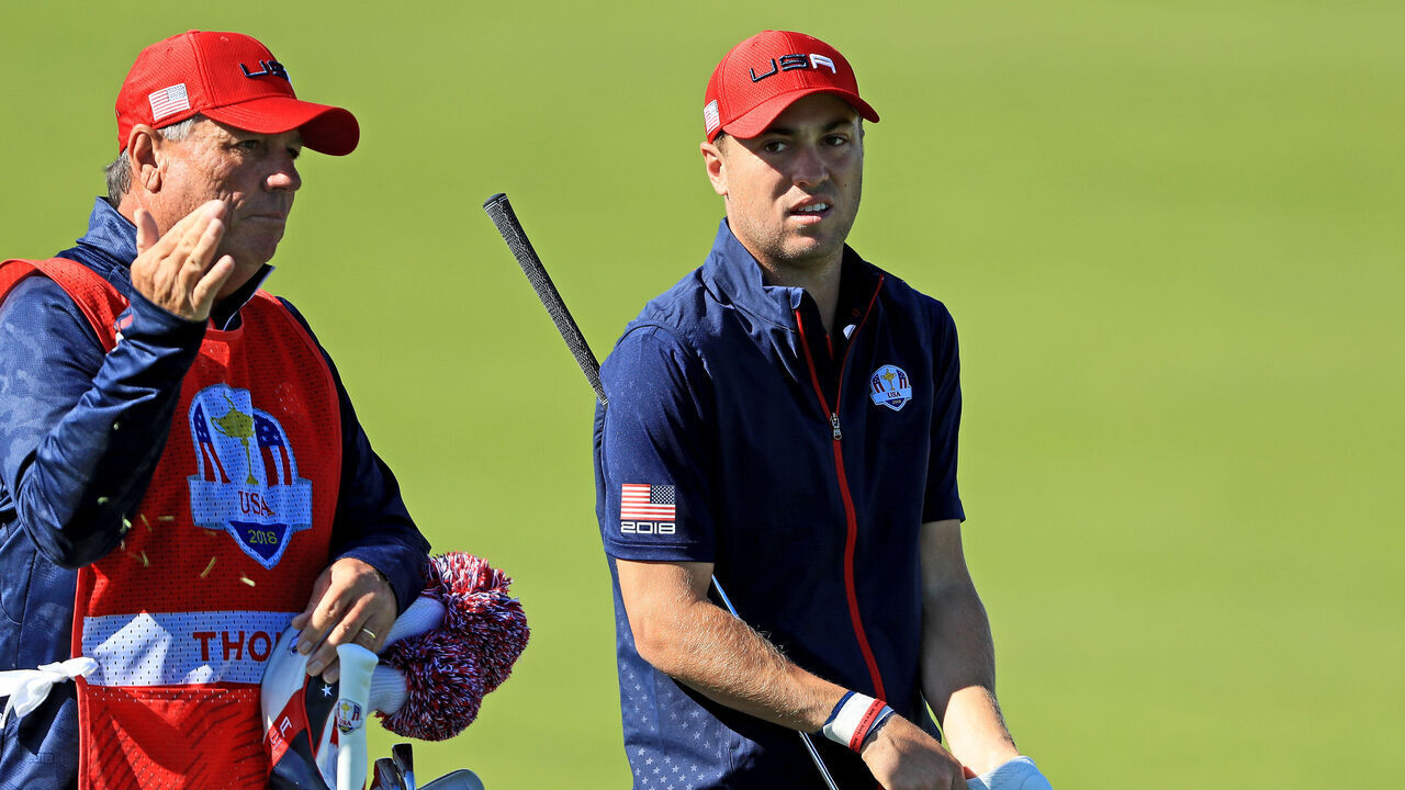 PARIS, FRANCE - SEPTEMBER 30: Justin Thomas of the United States prepares to play his second shot on the 10th hole in his match against Rory McIlroy of the European Team during singles matches of the 2018 Ryder Cup at Le Golf National on September 30, 2018 in Paris, France.