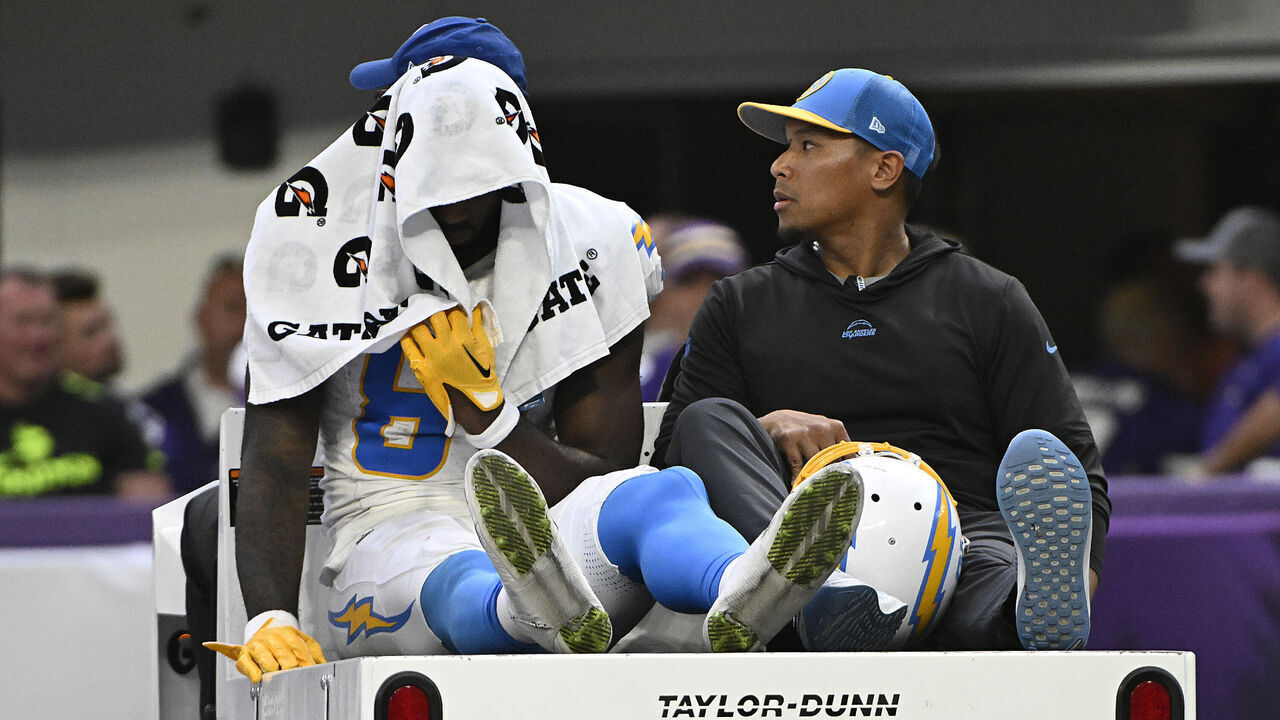 MINNEAPOLIS, MINNESOTA - SEPTEMBER 24: Mike Williams #81 of the Los Angeles Chargers is carted off the field during the fourth quarter against the Minnesota Vikings at U.S. Bank Stadium on September 24, 2023 in Minneapolis, Minnesota.