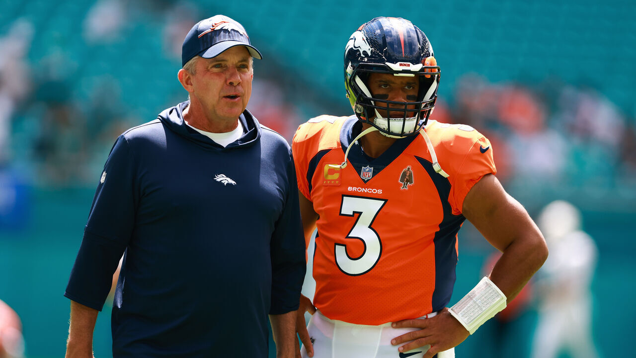 MIAMI GARDENS, FLORIDA - SEPTEMBER 24: Head coach Sean Payton of the Denver Broncos talks to Russell Wilson #3 of the Denver Broncos prior to a game against the Miami Dolphins at Hard Rock Stadium on September 24, 2023 in Miami Gardens, Florida.