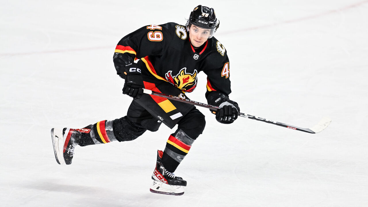 CALGARY, AB - FEBRUARY 28: Calgary Flames Left Wing Jakob Pelletier (49) skates during the first period of an NHL game between the Calgary Flames and the Boston Bruins on February 28, 2023, at the Scotiabank Saddledome in Calgary, AB.