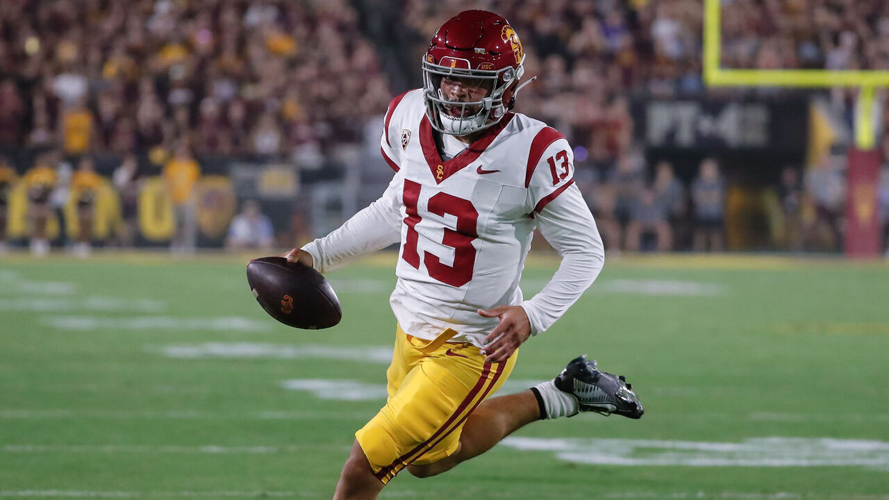 TEMPE, AZ - SEPTEMBER 23: USC Trojans quarterback Caleb Williams (13) runs the ball during the college football game between the USC Trojans and the Arizona State Sun Devils on September 23, 2023 at Mountain America Stadium in Tempe, Arizona.