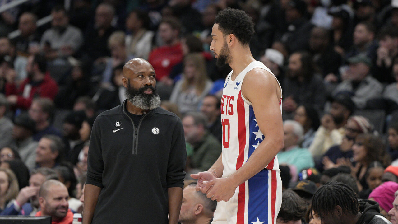 WASHINGTON, DC - DECEMBER 12: Brooklyn Nets head coach Jacque Vaughn talks with Ben Simmons #10 during the first half of the game against the Washington Wizards at Capital One Arena on December 12, 2022 in Washington, DC.
