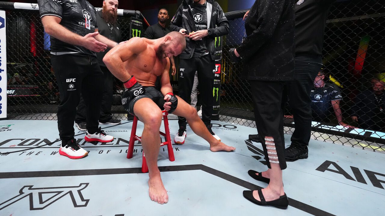 LAS VEGAS, NEVADA - SEPTEMBER 23: Rafael Fiziev of Kazakstan reacts after suffering a knee injury against Mateusz Gamrot of Poland in a lightweight fight during the UFC Fight Night event at UFC APEX on September 23, 2023 in Las Vegas, Nevada.