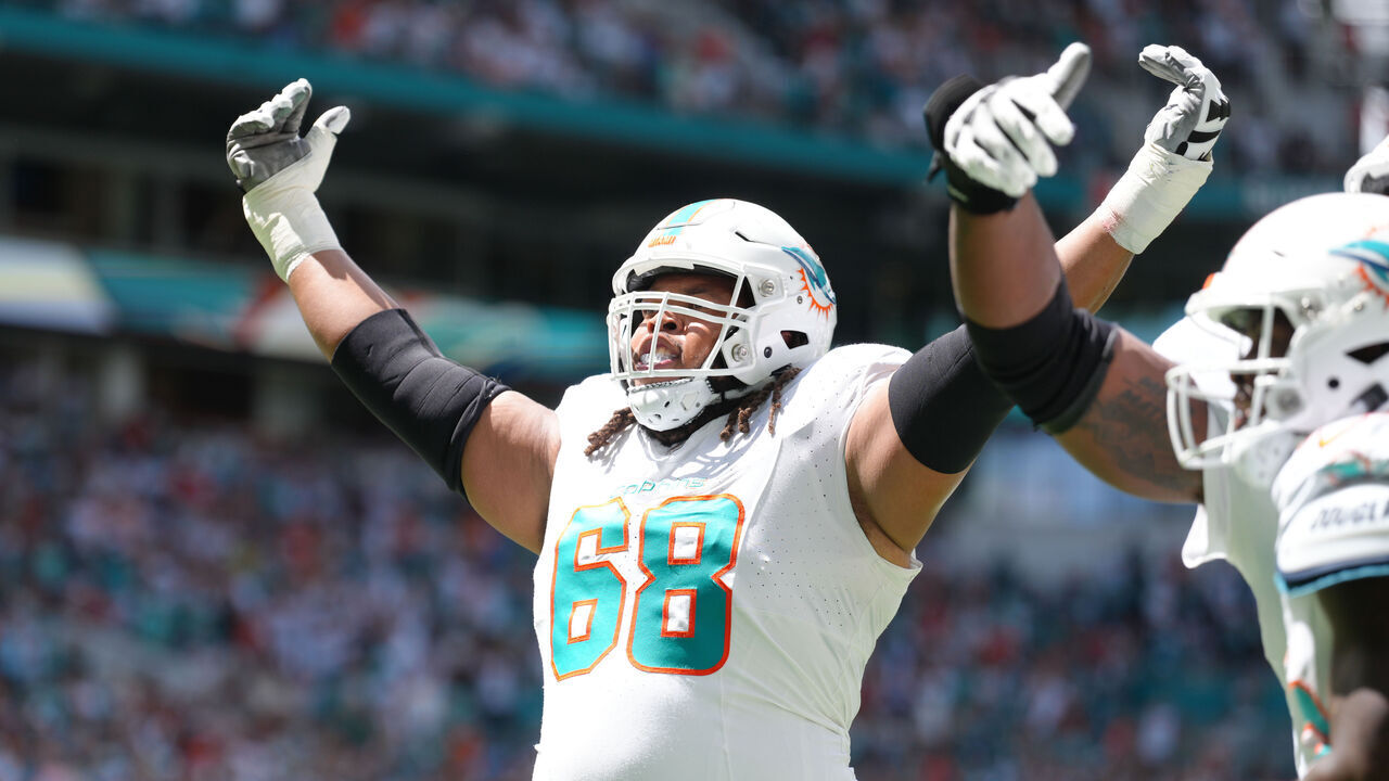 MIAMI GARDENS, FL - SEPTEMBER 24: Miami Dolphins offensive tackle Robert Hunt (68) celebrates a rushing touchdown in the first half during the game between the Denver Broncos and the Miami Dolphins on Sunday, September 24, 2023 at Hard Rock Stadium, Miami, Fla.