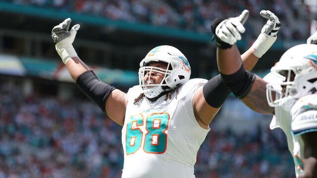 MIAMI GARDENS, FL - SEPTEMBER 24: Miami Dolphins offensive tackle Robert Hunt (68) celebrates a rushing touchdown in the first half during the game between the Denver Broncos and the Miami Dolphins on Sunday, September 24, 2023 at Hard Rock Stadium, Miami, Fla.