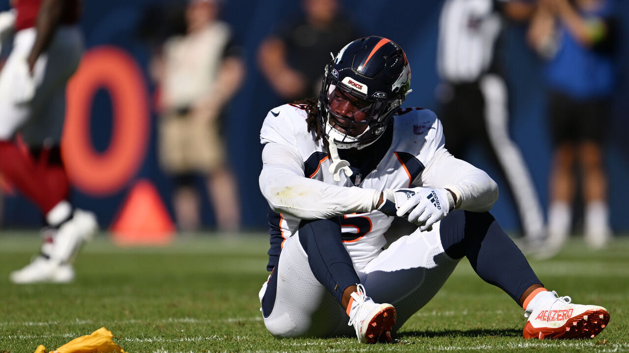 DENVER, COLORADO - SEPTEMBER 17: Denver Broncos linebacker Randy Gregory (5) sits on the field after a flag was tossed during the first half of the game at Empower Field at Mile High on September 17, 2023 in Denver, Colorado. The Denver Broncos took on the Washington Commanders during week 2 of the 2023 NFL season.