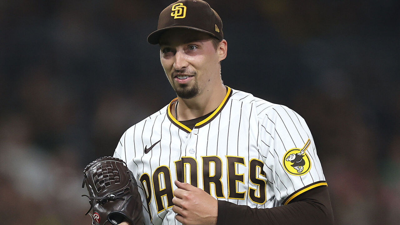 SAN DIEGO, CALIFORNIA - SEPTEMBER 19: Blake Snell #4 of the San Diego Padres reacts as he walks to the dugout after throwing seven hitless innings a game against the Colorado Rockies at PETCO Park on September 19, 2023 in San Diego, California.