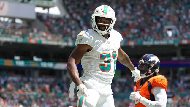 MIAMI GARDENS, FL - SEPTEMBER 24: Miami Dolphins running back Raheem Mostert (31) leaps in celebration after a touchdown during the game between the Denver Broncos and the Miami Dolphins on Sunday, September 24, 2023 at Hard Rock Stadium, Miami, Fla.
