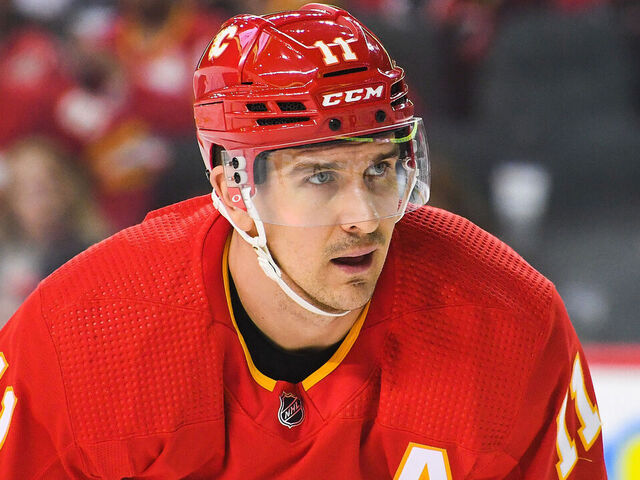 CALGARY, CANADA - APRIL 2: Mikael Backlund #11 of the Calgary Flames in action against the Anaheim Ducks during an NHL game at Scotiabank Saddledome on April 2, 2023 in Calgary, Alberta, Canada. The Flames defeated the Ducks 5-4.