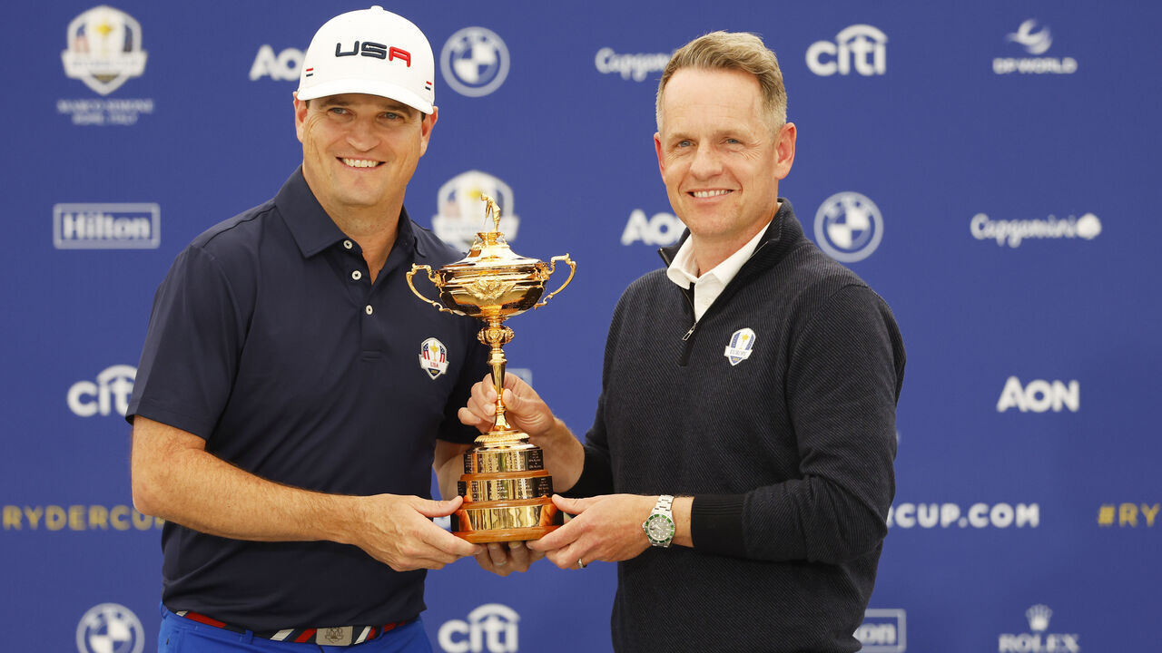 ROME, ITALY - SEPTEMBER 25: Zach Johnson, Captain of Team United States and Luke Donald, Captain of Team Europe pose with the trophy after a joint press conference prior to the 2023 Ryder Cup at Marco Simone Golf Club on September 25, 2023 in Rome, Italy.