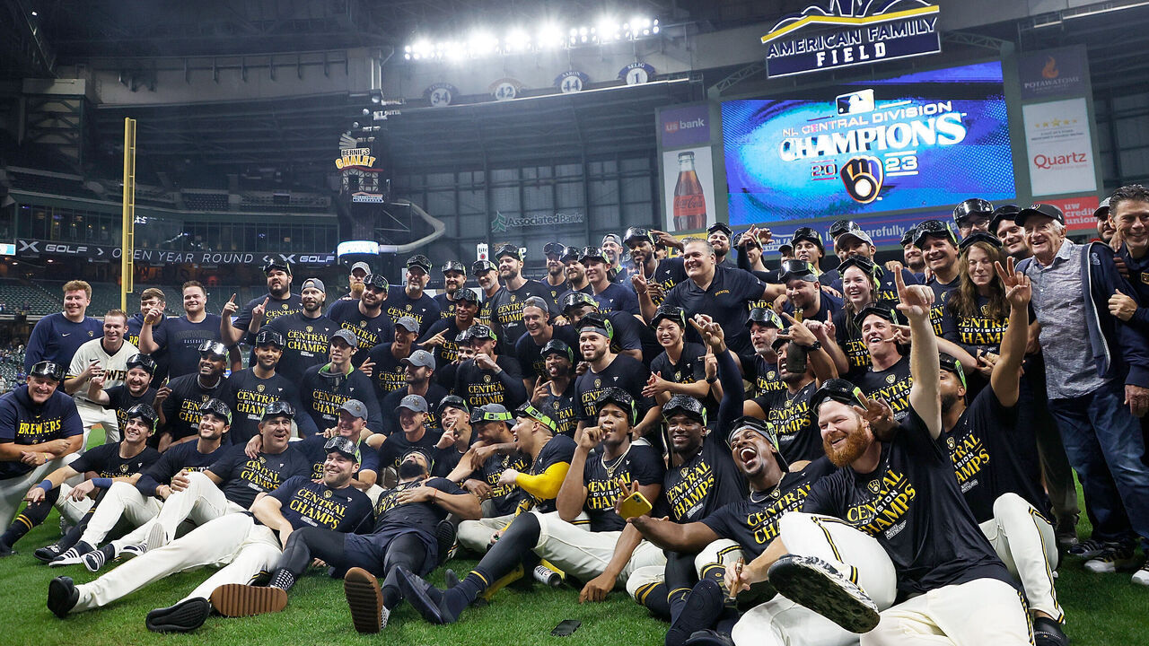 MILWAUKEE, WISCONSIN - SEPTEMBER 26: Milwaukee Brewers players take a team picture after winning the National League Central Division at American Family Field on September 26, 2023 in Milwaukee, Wisconsin.