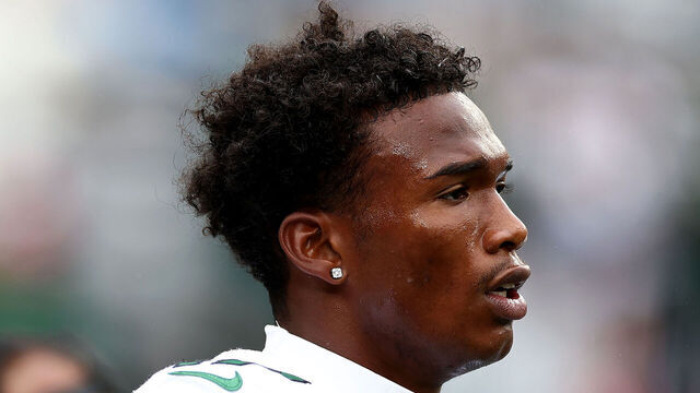 EAST RUTHERFORD, NEW JERSEY - SEPTEMBER 24: Garrett Wilson #17 of the New York Jets looks on during warm ups before the game against the New England Patriots at MetLife Stadium on September 24, 2023 in East Rutherford, New Jersey.