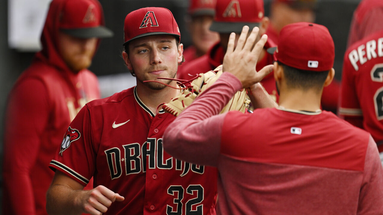 CHICAGO, ILLINOIS - SEPTEMBER 27: Brandon Pfaadt #32 of the Arizona Diamondbacks celebrates in the dugout after being relieved in the sixth inning against the Chicago White Sox at Guaranteed Rate Field on September 27, 2023 in Chicago, Illinois.