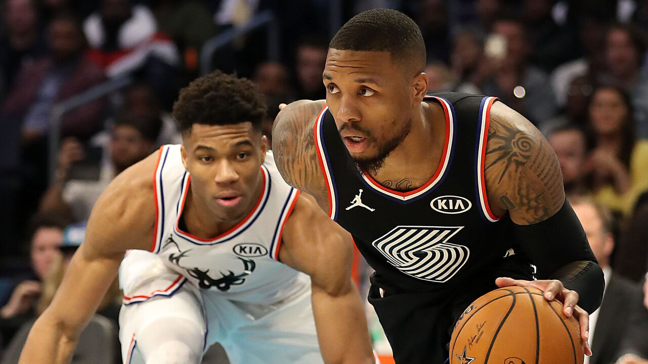 CHARLOTTE, NORTH CAROLINA - FEBRUARY 17: Damian Lillard #0 of the Portland Trail Blazers and Team LeBron drives against Giannis Antetokounmpo #34 of the Milwaukee Bucks and Team Giannis in the fourth quarter during the NBA All-Star game as part of the 2019 NBA All-Star Weekend at Spectrum Center on February 17, 2019 in Charlotte, North Carolina. Team LeBron won 178-164. NOTE TO USER: User expressly acknowledges and agrees that, by downloading and/or using this photograph, user is consenting to the terms and conditions of the Getty Images License Agreement.