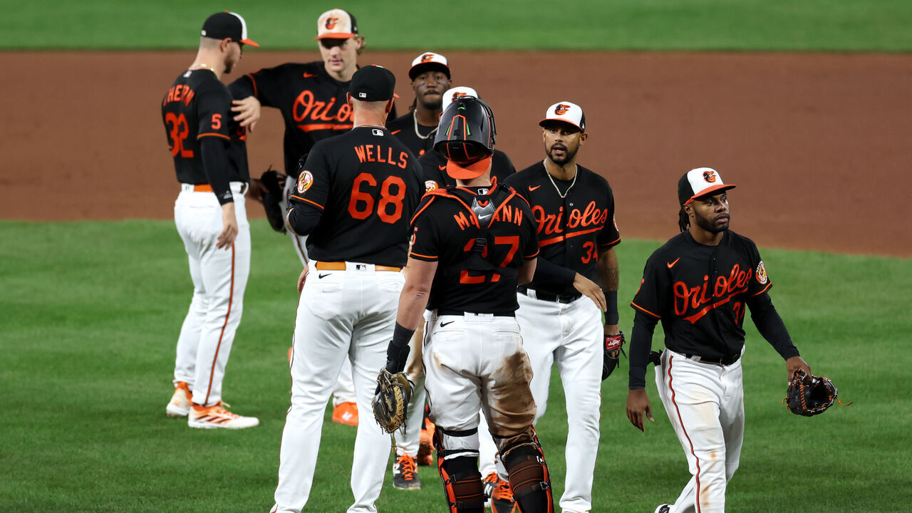 BALTIMORE, MARYLAND - SEPTEMBER 27: Members of the Baltimore Orioles celebrate their 5-1 win over the Washington Nationals at Oriole Park at Camden Yards on September 27, 2023 in Baltimore, Maryland.