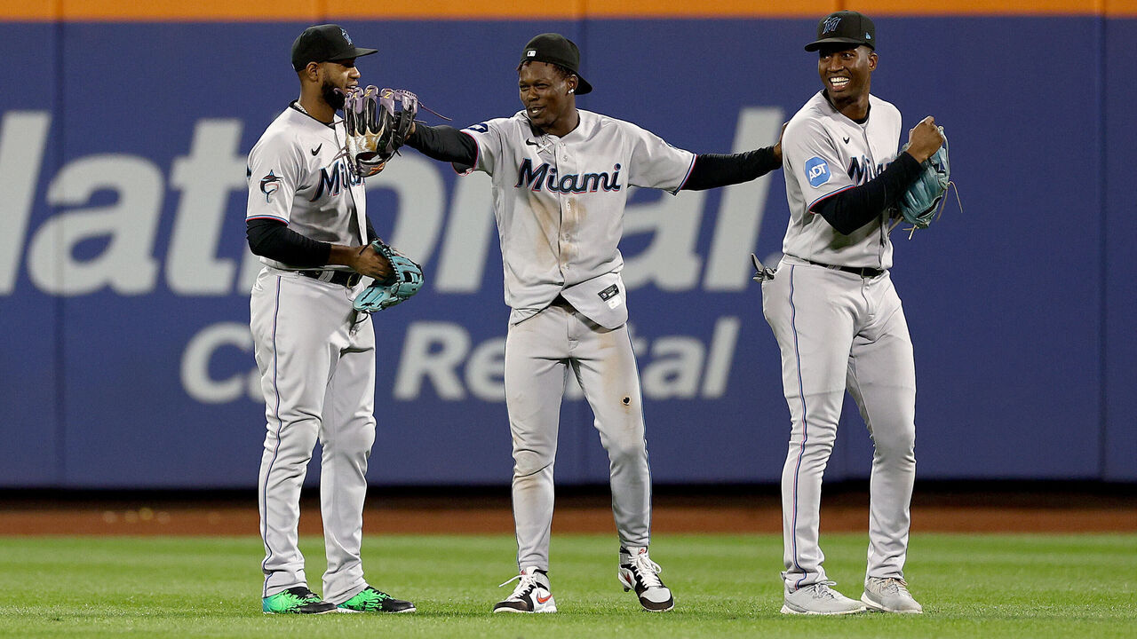 NEW YORK, NEW YORK - SEPTEMBER 27: Bryan De La Cruz #14,Jazz Chisholm Jr. #2 and Jesus Sanchez #7 of the Miami Marlins celebrate the win over the New York Mets during game two of a double header at Citi Field on September 27, 2023 in the Flushing neighborhood of the Queens borough of New York City. The Miami Marlins defeated the New York Mets 4-2.