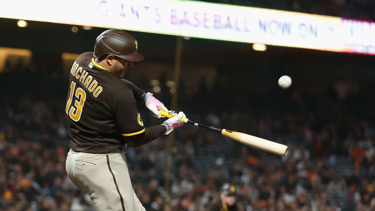 SAN FRANCISCO, CALIFORNIA - SEPTEMBER 27: Manny Machado #13 of the San Diego Padres hits a two0run single in the top of the tenth inning against the San Francisco Giants at Oracle Park on September 27, 2023 in San Francisco, California.