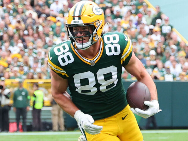 GREEN BAY, WISCONSIN - SEPTEMBER 24: Luke Musgrave #88 of the Green Bay Packers runs for yards after a catch during a game against the New Orleans Saints at Lambeau Field on September 24, 2023 in Green Bay, Wisconsin.