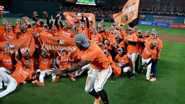BALTIMORE, MARYLAND - SEPTEMBER 28: Jorge Mateo #3 of the Baltimore Orioles celebrates with the team while posing for a group photo after the Orioles defeated the Boston Red Sox to win the American League East at Oriole Park at Camden Yards on September 28, 2023 in Baltimore, Maryland.