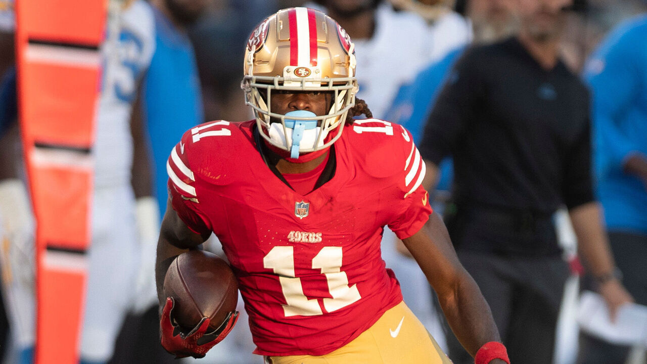 SANTA CLARA, CA - AUGUST 25: Brandon Aiyuk #11 of the San Francisco 49ers runs after making a catch during the game against the Los Angeles Chargers at Levi's Stadium on August 25, 2023 in Santa Clara, California. The Chargers defeated the 49ers 23-12.