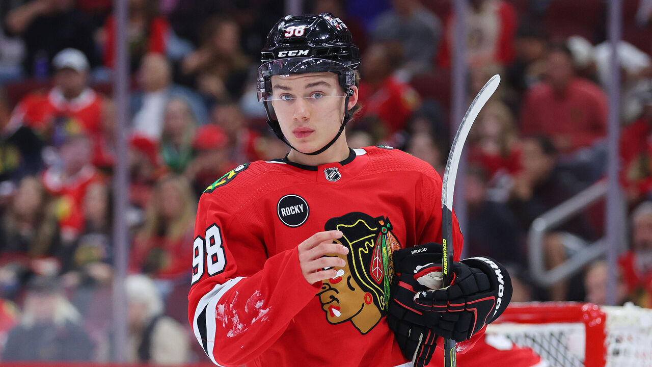 CHICAGO, ILLINOIS - SEPTEMBER 28: Connor Bedard #98 of the Chicago Blackhawks looks on against the St. Louis Blues during the first period of a preseason game at the United Center on September 28, 2023 in Chicago, Illinois.