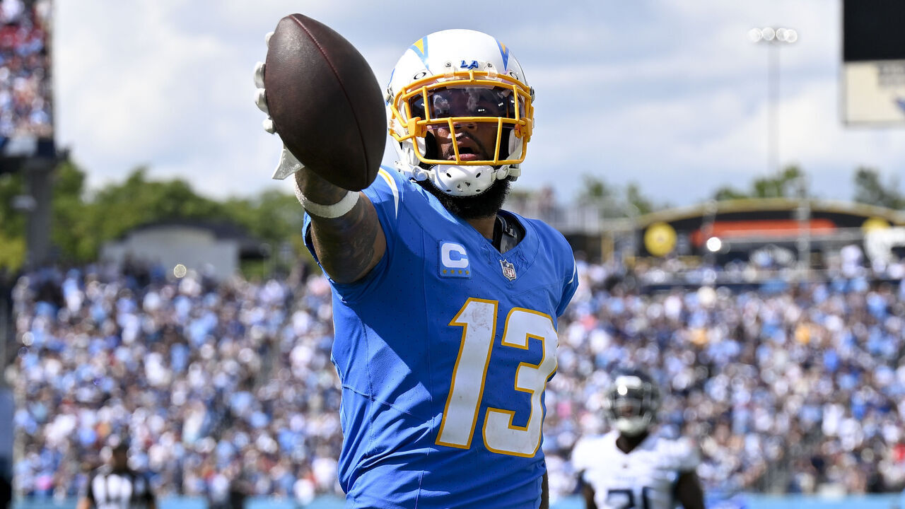 NASHVILLE, TENNESSEE - SEPTEMBER 17: Keenan Allen #13 of the Los Angeles Chargers celebrates after scoring a touchdown during an NFL football game against the Tennessee Titans at Nissan Stadium on September 17, 2023 in Nashville, Tennessee. The Tennessee Titans won 27-24 in overtime.