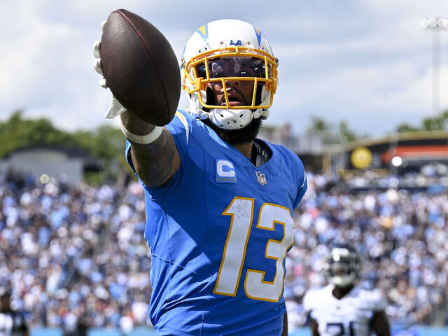 NASHVILLE, TENNESSEE - SEPTEMBER 17: Keenan Allen #13 of the Los Angeles Chargers celebrates after scoring a touchdown during an NFL football game against the Tennessee Titans at Nissan Stadium on September 17, 2023 in Nashville, Tennessee. The Tennessee Titans won 27-24 in overtime.