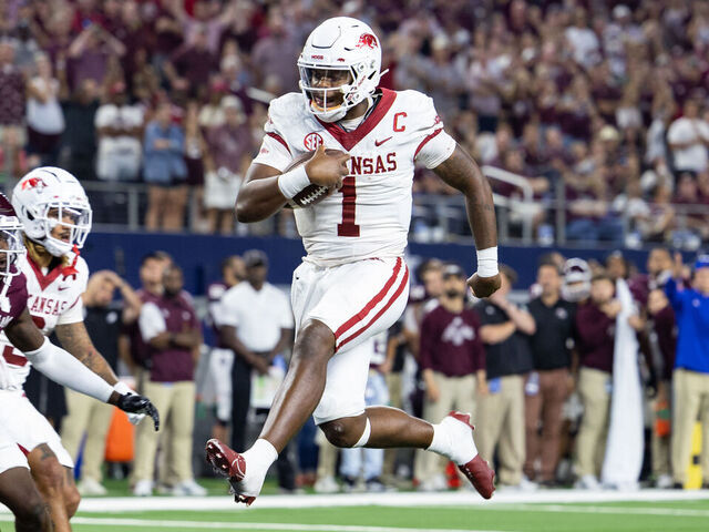 ARLINGTON, TX - SEPTEMBER 24: Arkansas Razorbacks quarterback KJ Jefferson (#1) jumps into the end zone for a touchdown during the Southwest Classic college football game between the Texas A&M Aggies and the Arkansas Razorbacks on September 24, 2022 at AT&T Stadium in Arlington, TX.