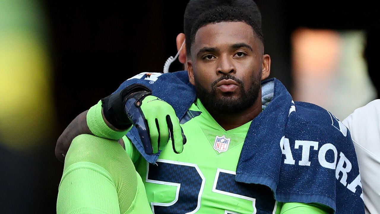 SEATTLE, WASHINGTON - SEPTEMBER 12: Jamal Adams #33 of the Seattle Seahawks is carted off the field with an injury during the second quarter against the Denver Broncos at Lumen Field on September 12, 2022 in Seattle, Washington.
