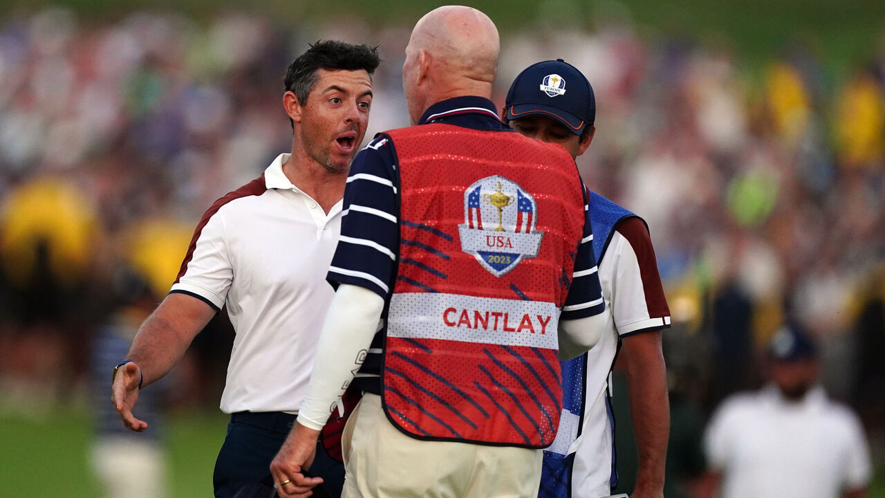 Team Europe's Rory McIlroy argues with Joe LaCava, caddie of USA's Patrick Cantlay on the 18th during the fourballs on day two of the 44th Ryder Cup at the Marco Simone Golf and Country Club, Rome, Italy. Picture date: Saturday September 30, 2023.