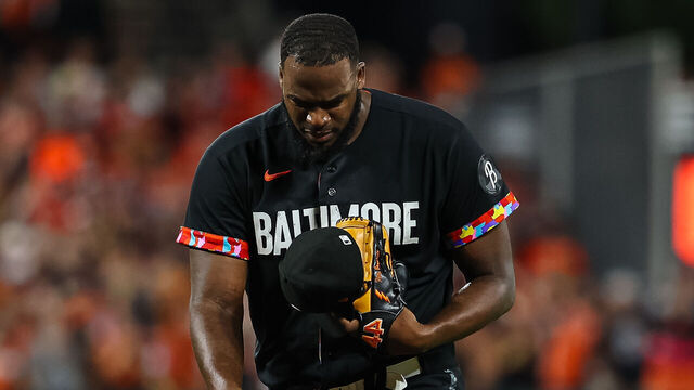 BALTIMORE, MD - AUGUST 25: Felix Bautista #74 of the Baltimore Orioles is injured while pitching during the ninth inning against the Colorado Rockies at Oriole Park at Camden Yards on August 25, 2023 in Baltimore, Maryland.