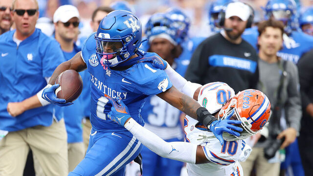 LEXINGTON, KY - SEPTEMBER 30: Kentucky Wildcats running back Ray Davis (1) battles Florida Gators safety Miguel Mitchell (10) in a game between the Florida Gators and the Kentucky Wildcats on September 30, 2023, at Kroger Field in Lexington, KY.