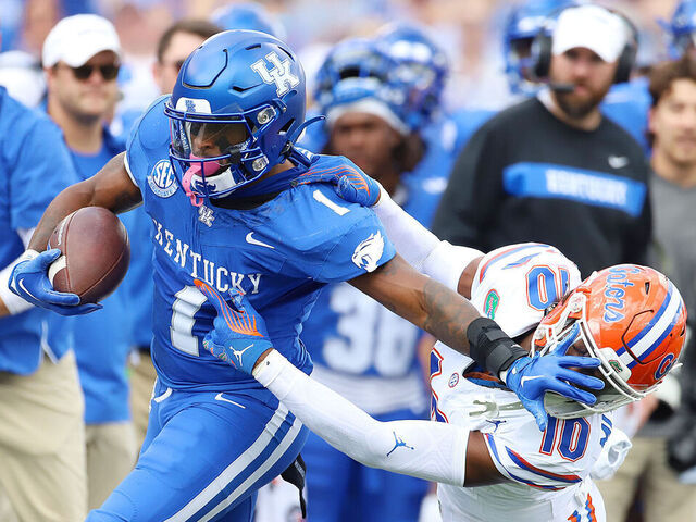 LEXINGTON, KY - SEPTEMBER 30: Kentucky Wildcats running back Ray Davis (1) battles Florida Gators safety Miguel Mitchell (10) in a game between the Florida Gators and the Kentucky Wildcats on September 30, 2023, at Kroger Field in Lexington, KY.