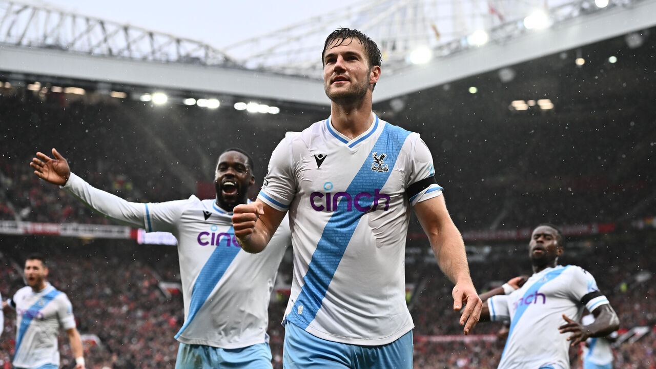 MANCHESTER, ENGLAND - SEPTEMBER 30: Joachim Andersen of Crystal Palace celebrate with Jeffrey Schlupp after scoring a goal during the Premier League match between Manchester United and Crystal Palace at Old Trafford on September 30, 2023 in Manchester, United Kingdom.