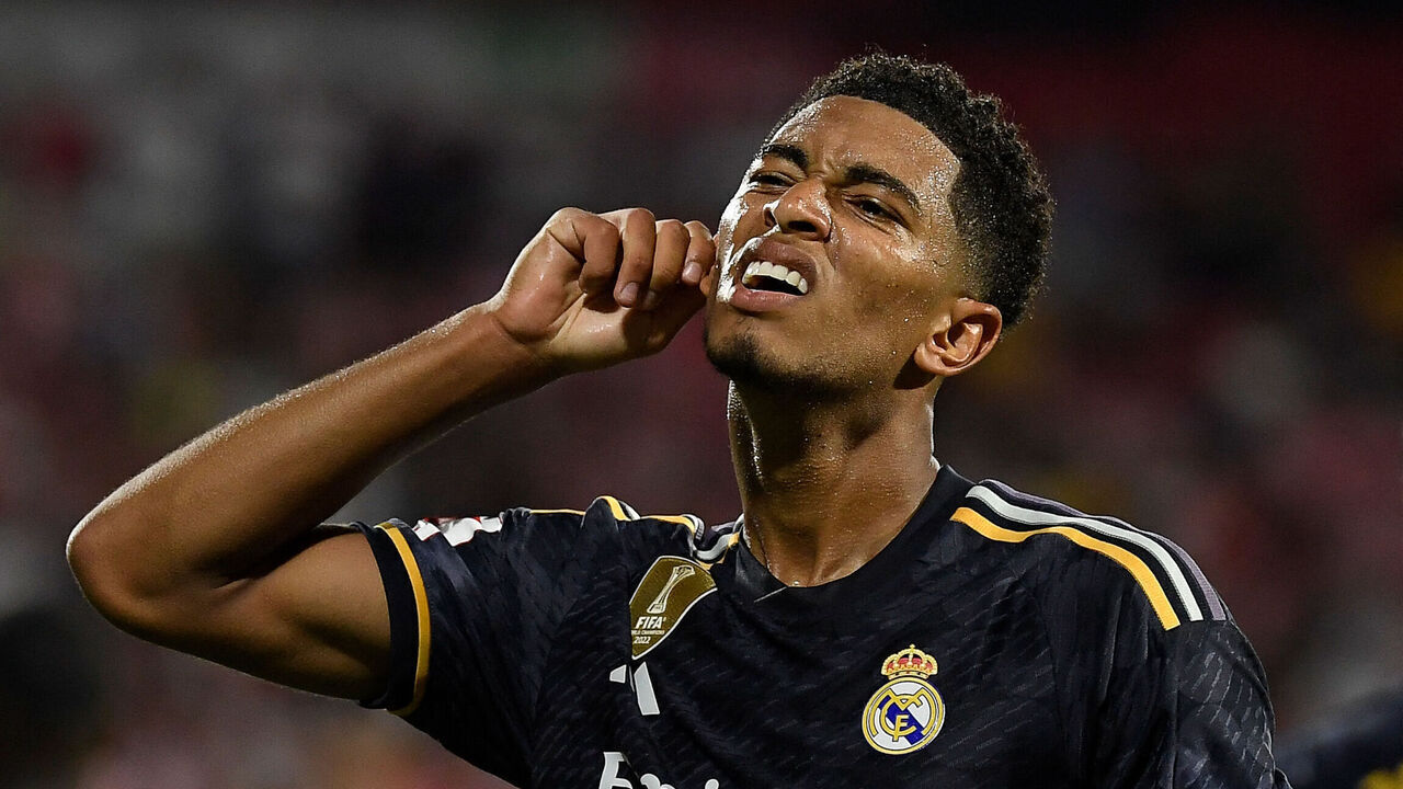 Real Madrid's English midfielder #5 Jude Bellingham celebrates after scoring his team's third goal during the Spanish Liga football match between Girona FC and Real Madrid CF at the Montilivi stadium in Girona on September 30, 2023.