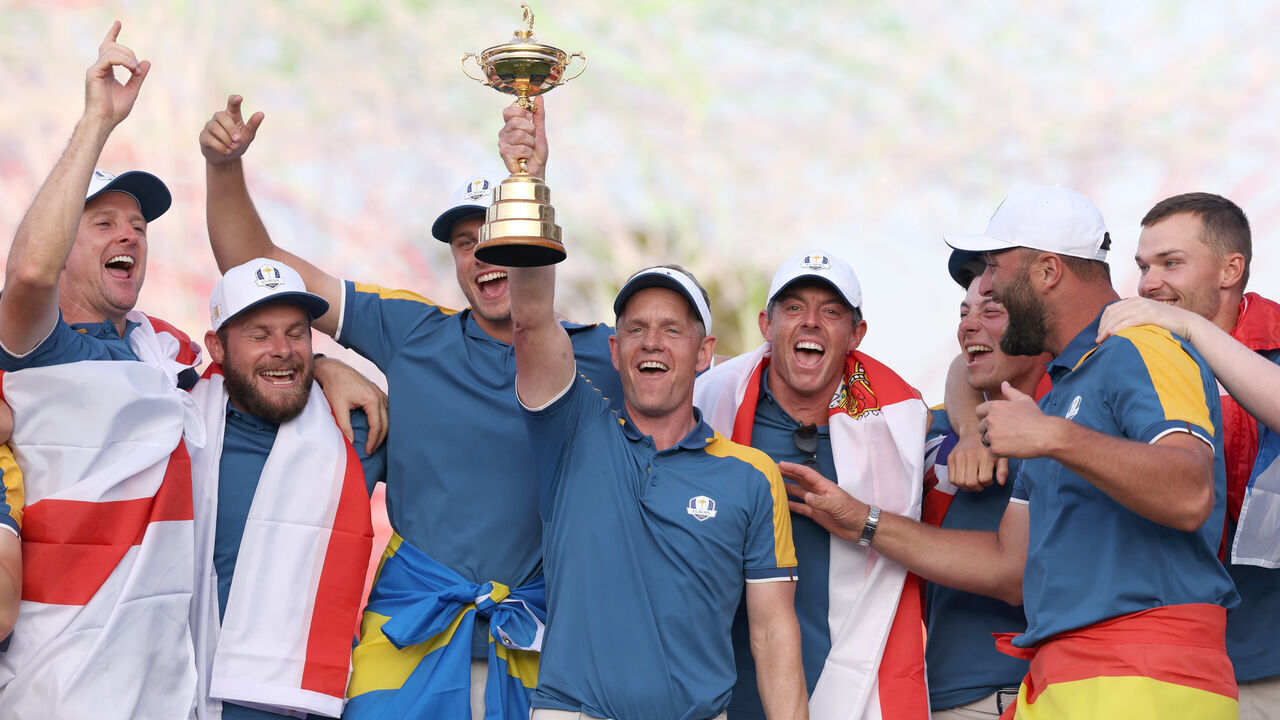 ROME, ITALY - OCTOBER 01: Luke Donald, Captain of Team Europe lifts the Ryder Cup trophy following victory with 16 and a half to 11 and a half win during the Sunday singles matches of the 2023 Ryder Cup at Marco Simone Golf Club on October 01, 2023 in Rome, Italy.