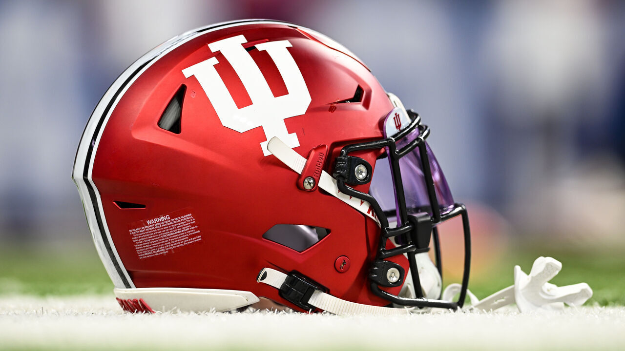 INDIANAPOLIS, IN - SEPTEMBER 16: An Indiana helmet sits on the field prior to a college football game between the Louisville Cardinals and Indiana Hoosiers on September 16, 2023 at Lucas Oil Stadium in Indianapolis, Indiana.
