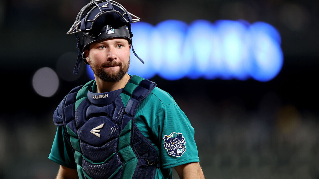 SEATTLE, WASHINGTON - SEPTEMBER 12: Cal Raleigh #29 of the Seattle Mariners looks on against the Los Angeles Angels at T-Mobile Park on September 12, 2023 in Seattle, Washington.