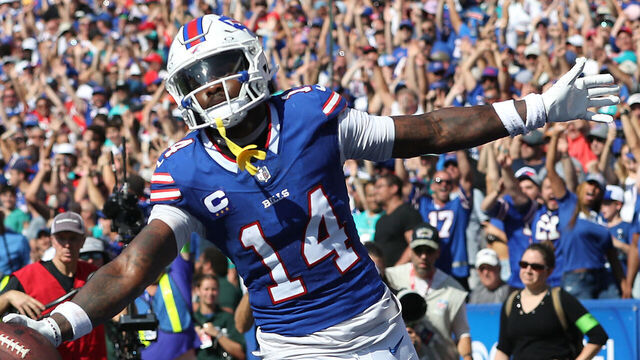 ORCHARD PARK, NEW YORK - OCTOBER 01: Stefon Diggs #14 of the Buffalo Bills celebrates his touchdown reception with Dawson Knox #88 during the second quarter against the Miami Dolphins at Highmark Stadium on October 01, 2023 in Orchard Park, New York.